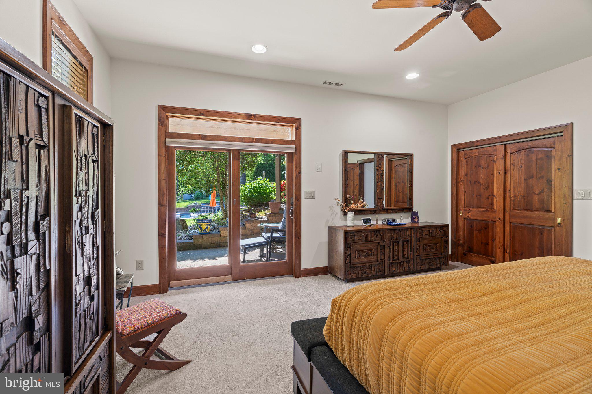477 Heritage Sewell, NJ 08080 - Photo 46 of 64 a bedroom with a bed and dresser with mirror