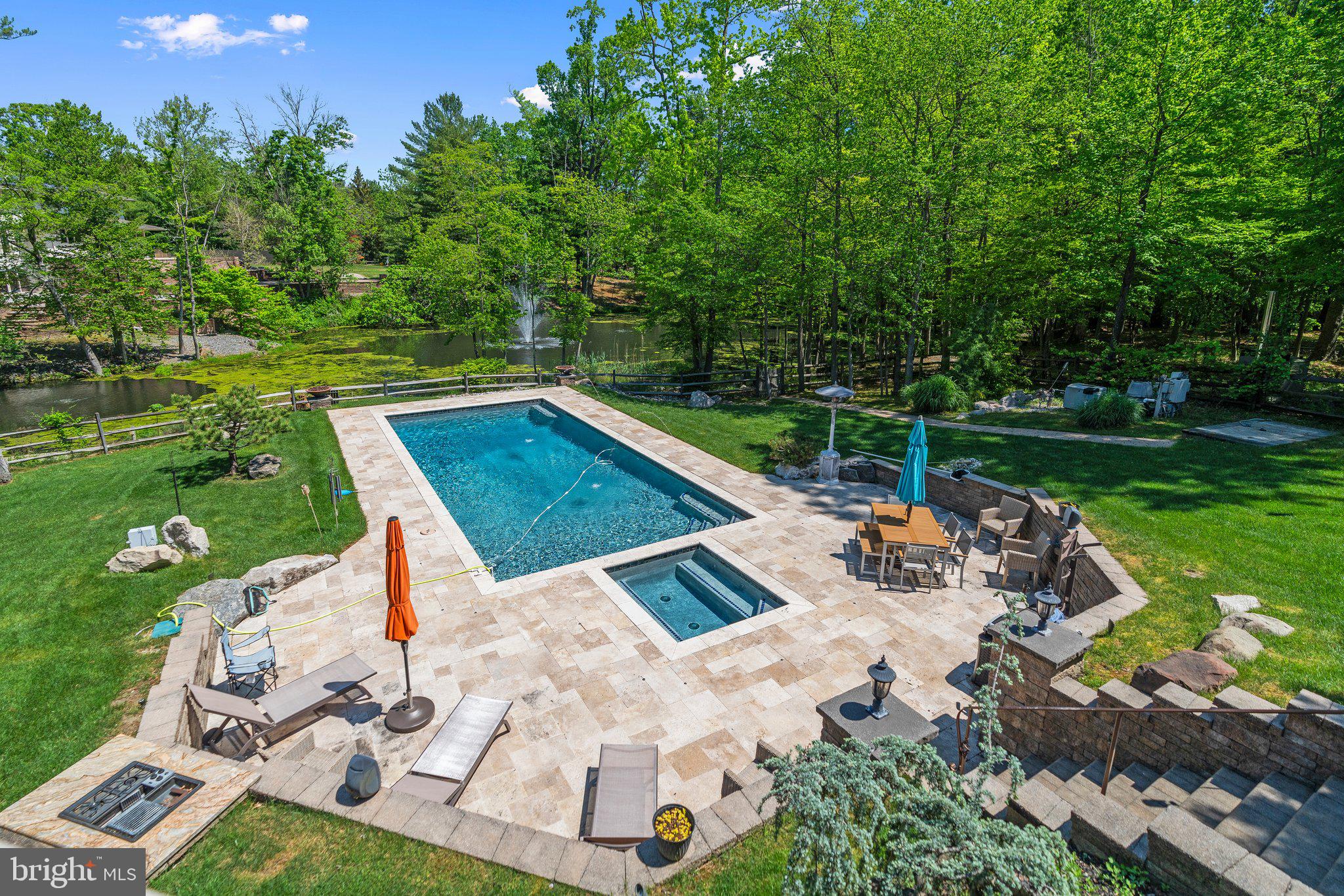 477 Heritage Sewell, NJ 08080 - Photo 54 of 64 a view of backyard with swimming pool and outdoor seating