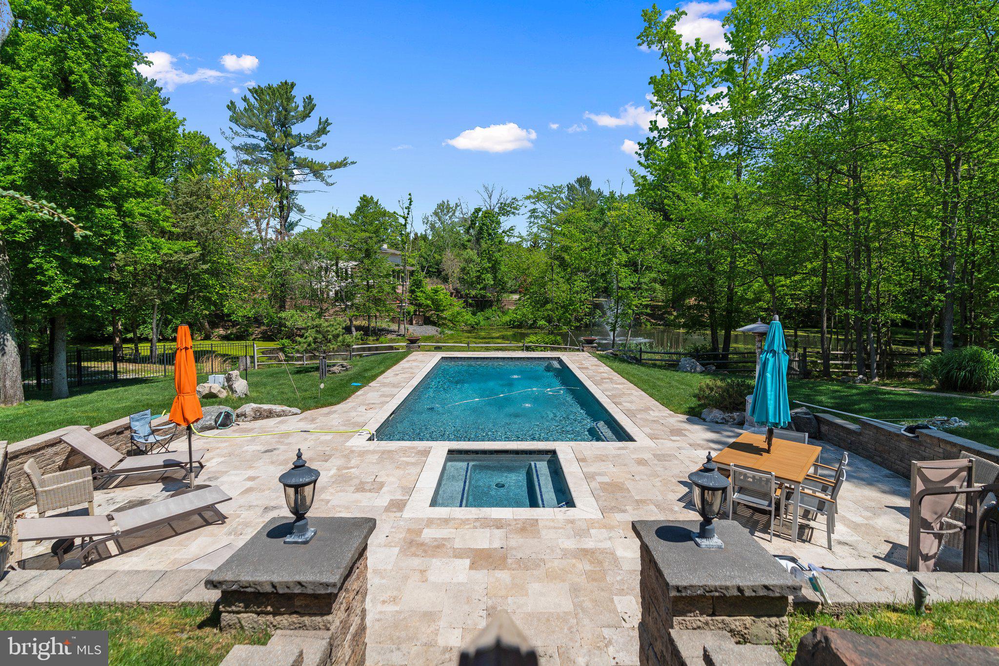 477 Heritage Sewell, NJ 08080 - Photo 55 of 64 a view of backyard with swimming pool and seating space