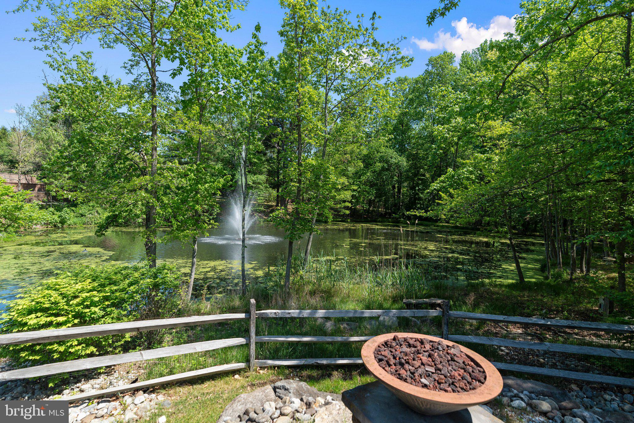 477 Heritage Sewell, NJ 08080 - Photo 56 of 64 a outdoor view with a lake view and a garden