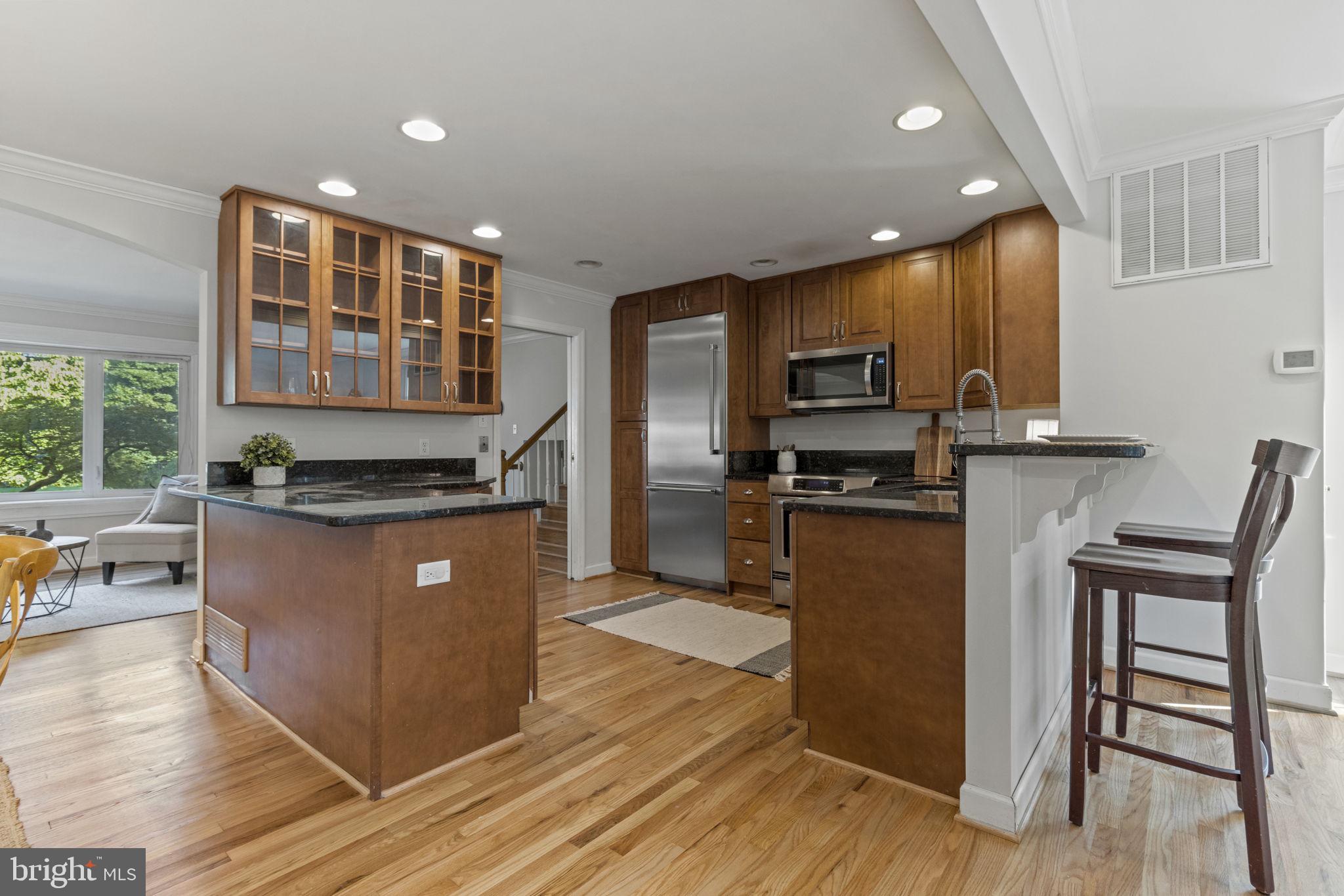 9 Wainwright Drive Annapolis, MD 21401 - Photo 7 of 41 Updated and open kitchen w/ granite countertops
