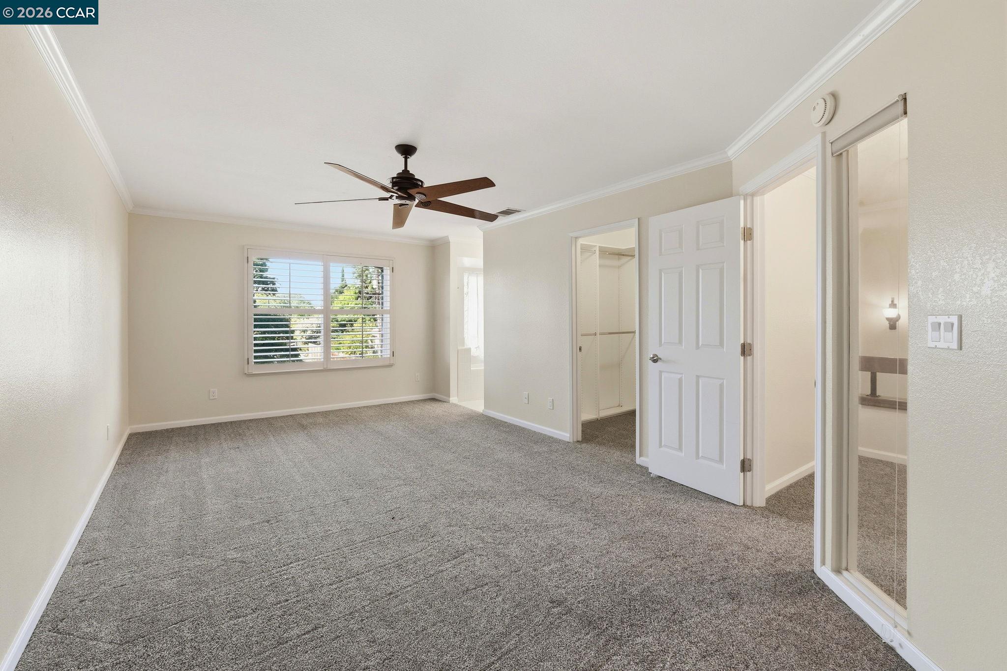 1707 Geary Road Walnut Creek, CA 94597 - Photo 22 of 43 an empty room with windows and closet