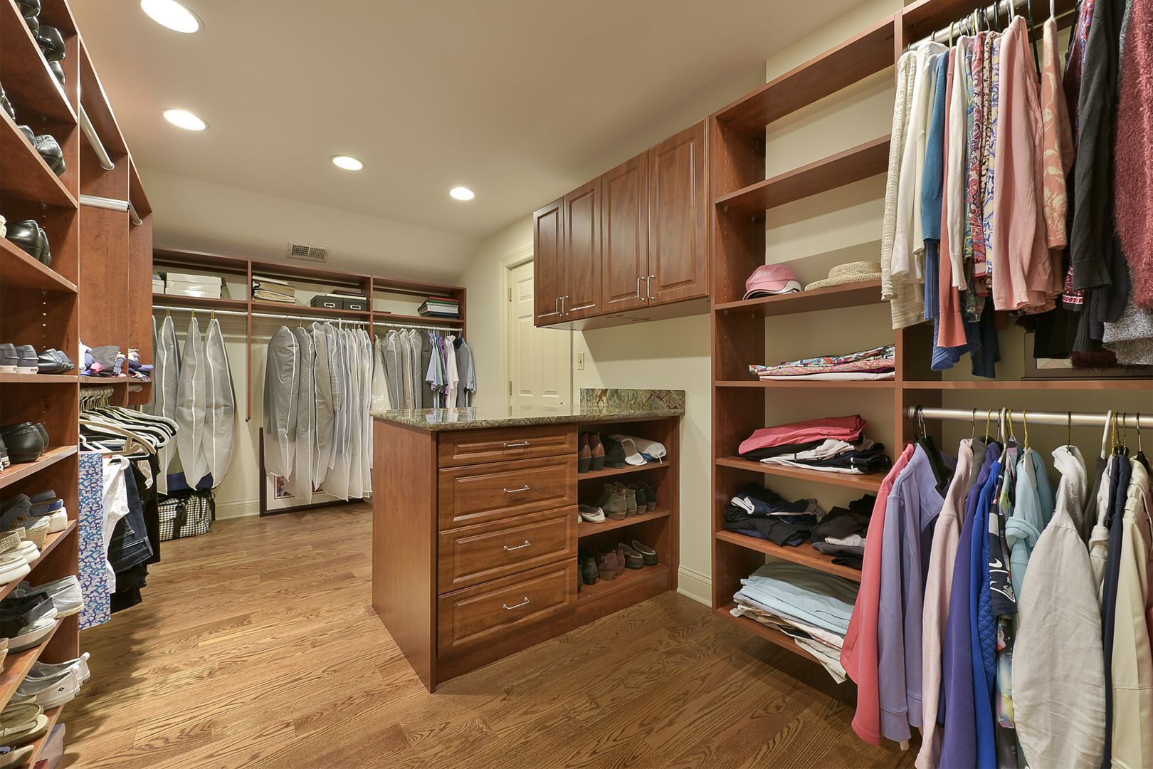 1720 Firth Road Inverness, IL 60067 - Photo 17 of 34 a view of walk in closet with clothes and shoes