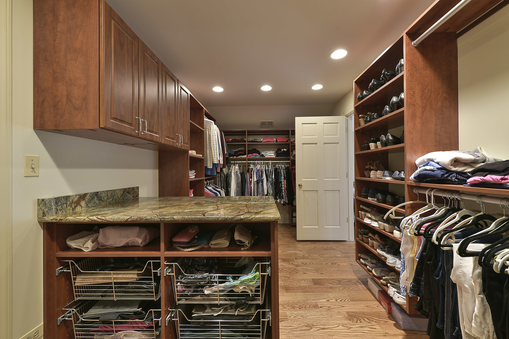 1720 Firth Road Inverness, IL 60067 - Photo 18 of 34 a kitchen with stainless steel appliances granite countertop wooden cabinets and a stove top oven