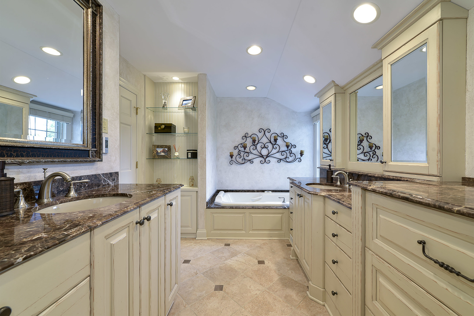 1720 Firth Road Inverness, IL 60067 - Photo 21 of 34 a bathroom with double sink and a mirror