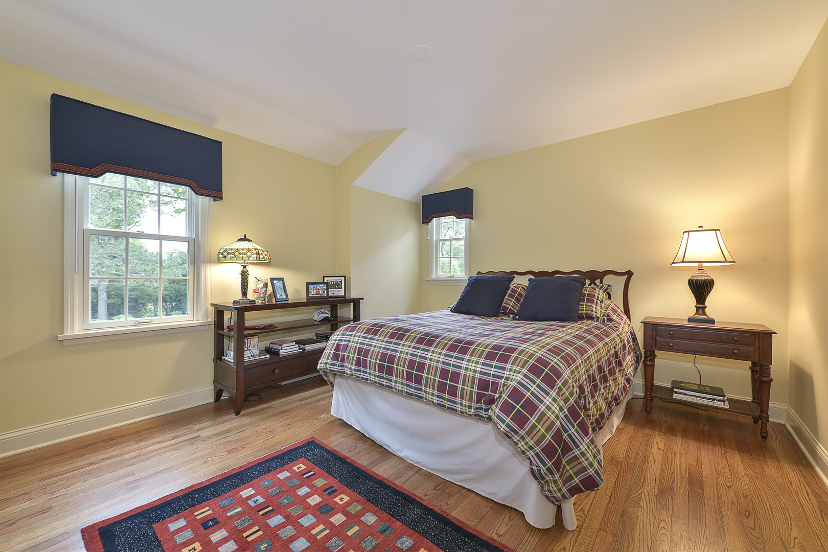1720 Firth Road Inverness, IL 60067 - Photo 22 of 34 a bedroom with a bed and wooden floor