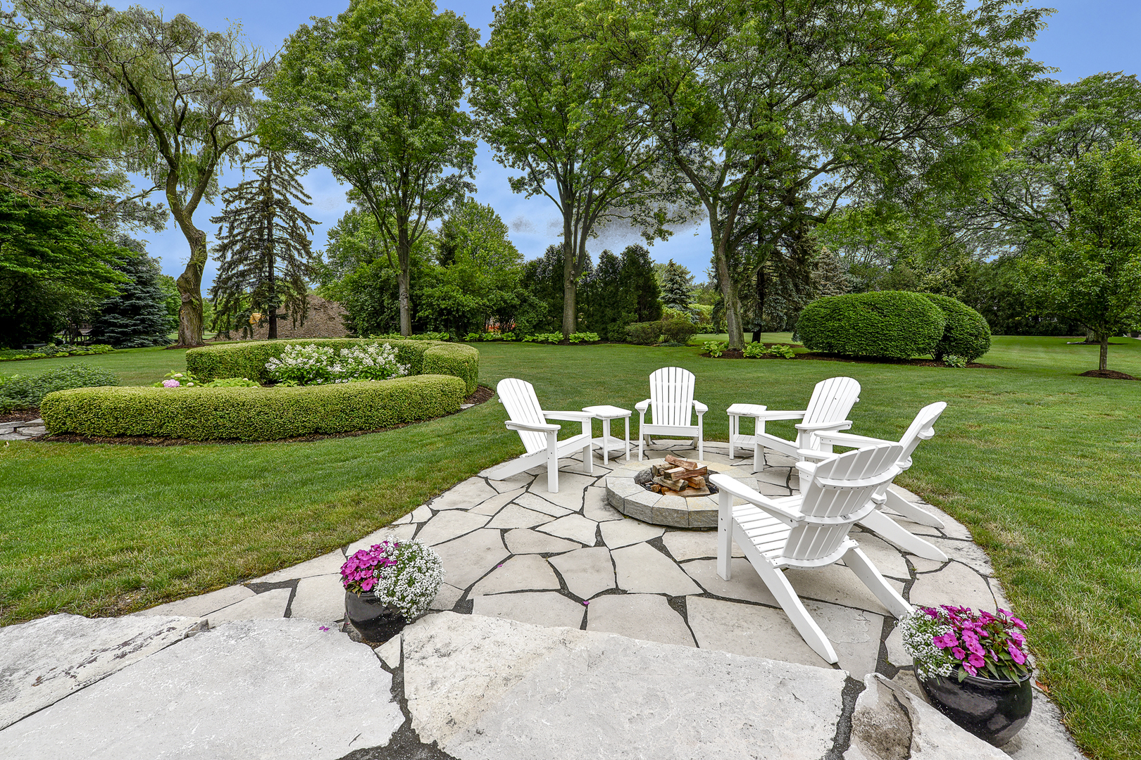 1720 Firth Road Inverness, IL 60067 - Photo 29 of 34 a view of a table and chairs and backyard in the back