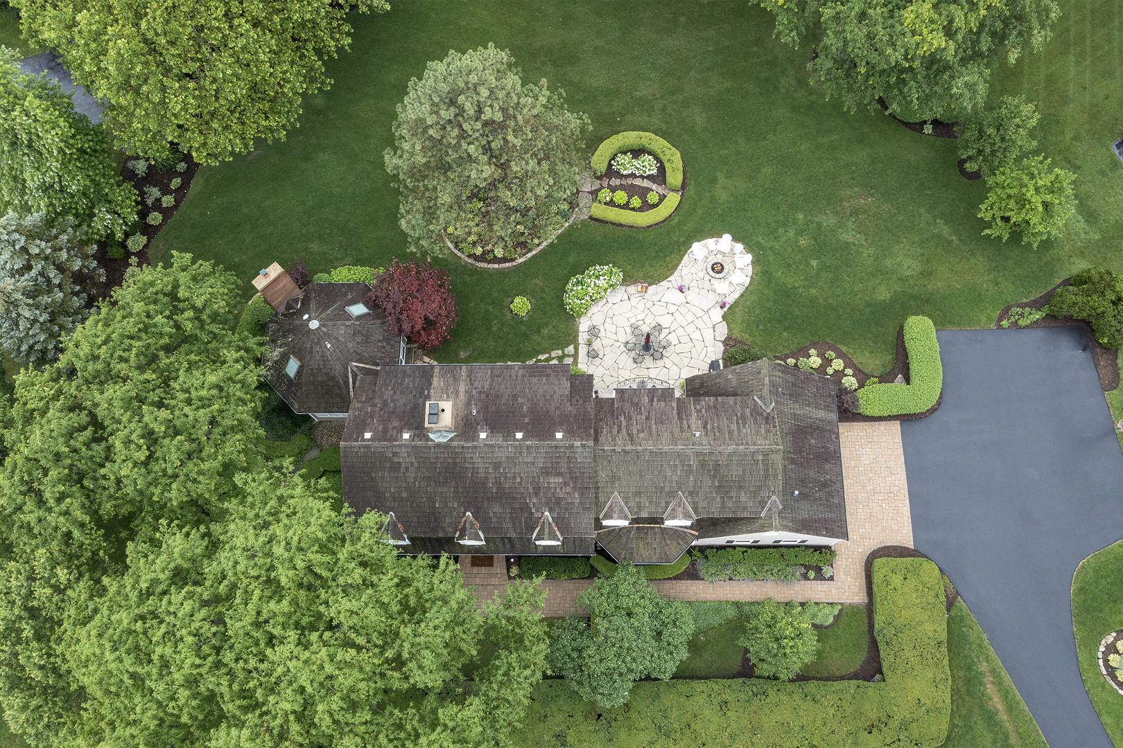 1720 Firth Road Inverness, IL 60067 - Photo 34 of 34 an aerial view of a house with garden space and sitting area