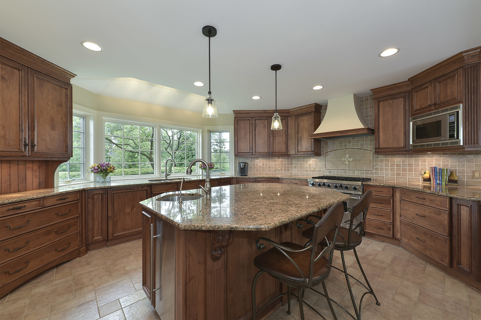 1720 Firth Road Inverness, IL 60067 - Photo 5 of 34 a kitchen with a table chairs sink and cabinets