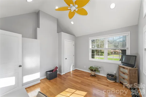 a bedroom with a bed and furniture