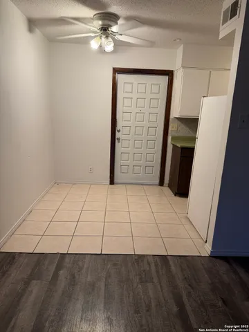 a bathroom with a toilet and a bathtub