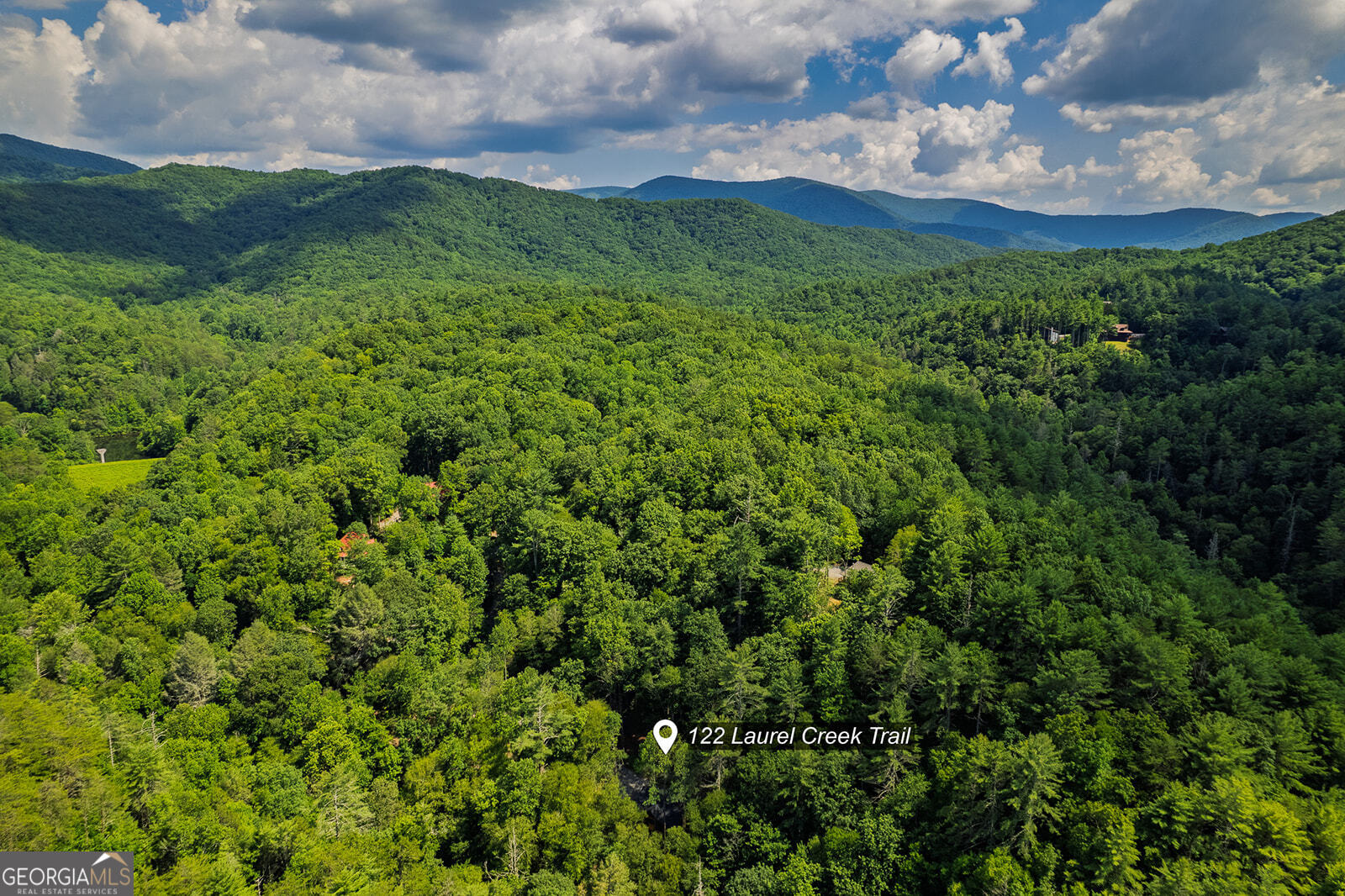 122 Laurel Creek Trail Blue Ridge, GA 30513 - Photo 16 of 18 a view of a lush green space with sea
