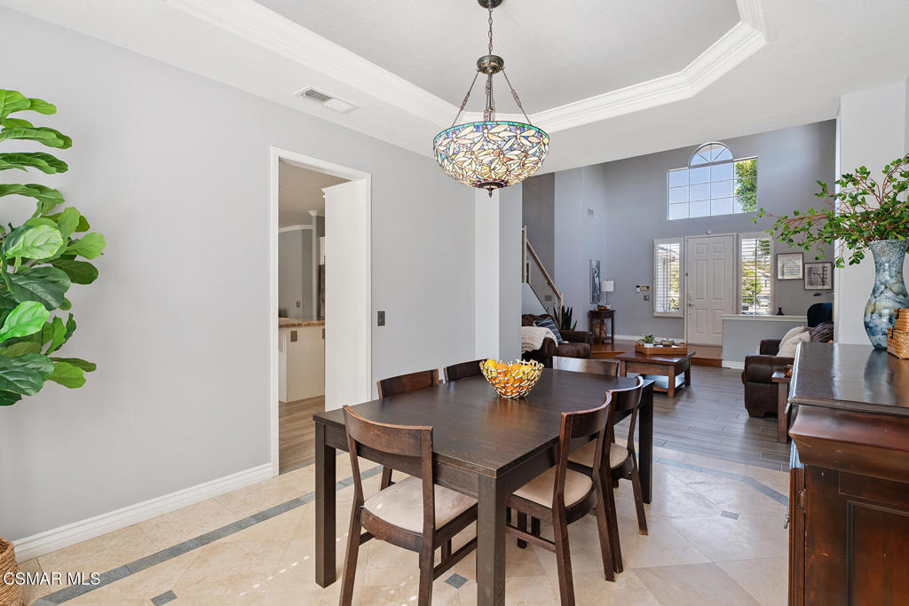 206 Shady Hills Court Simi Valley, CA 93065 - Photo 12 of 84 a view of a dining room with furniture and wooden floor