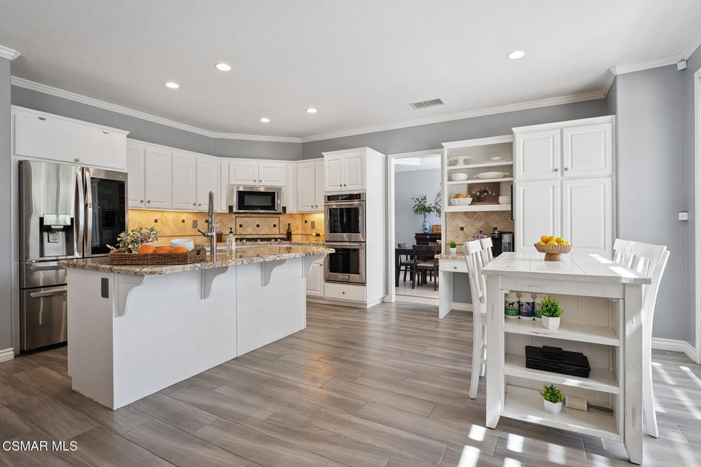 206 Shady Hills Court Simi Valley, CA 93065 - Photo 13 of 84 a kitchen with counter top space cabinets and stainless steel appliances