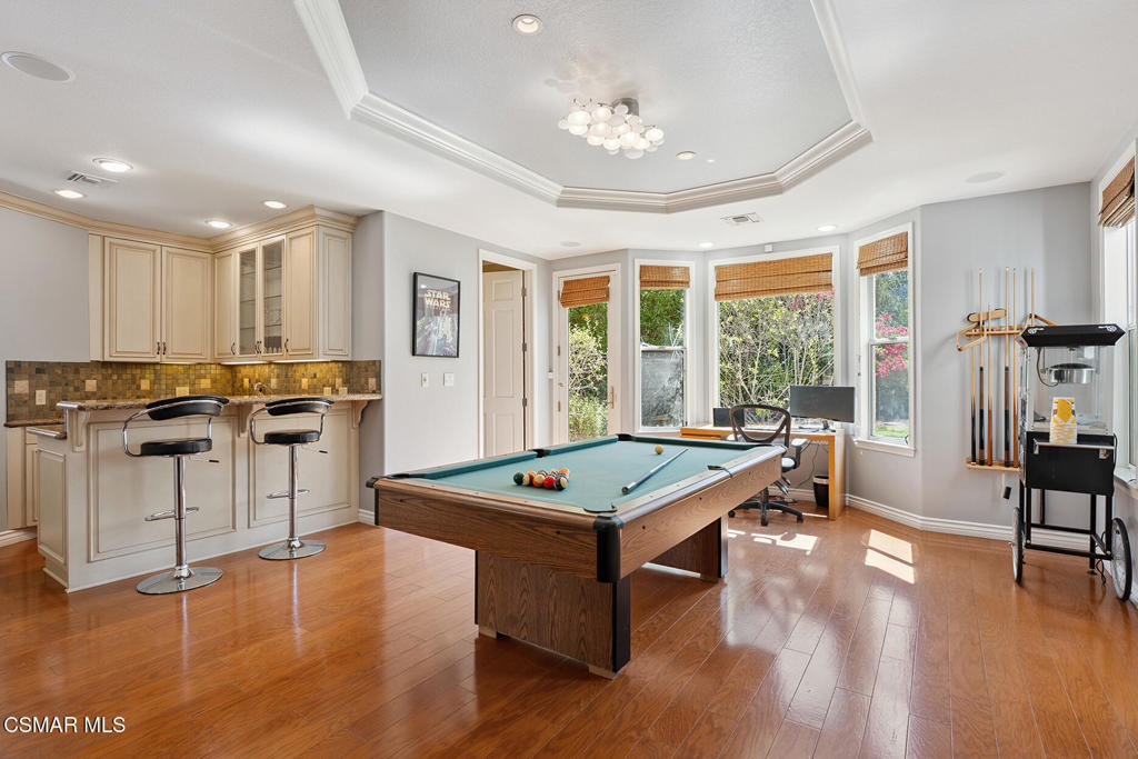 206 Shady Hills Court Simi Valley, CA 93065 - Photo 21 of 84 a living room with stainless steel appliances kitchen island granite countertop furniture and a view of kitchen