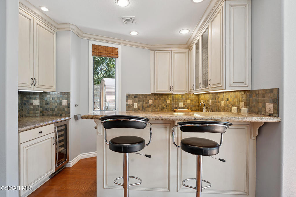 206 Shady Hills Court Simi Valley, CA 93065 - Photo 25 of 84 a kitchen with stainless steel appliances granite countertop a stove a sink and a refrigerator