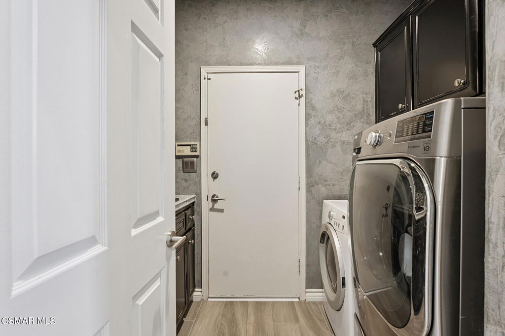 206 Shady Hills Court Simi Valley, CA 93065 - Photo 29 of 84 a view of walk in closet with clothes and shoes