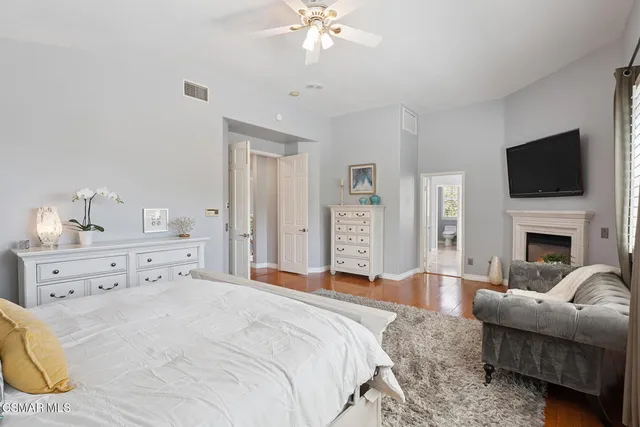 a view of a backyard with swimming pool