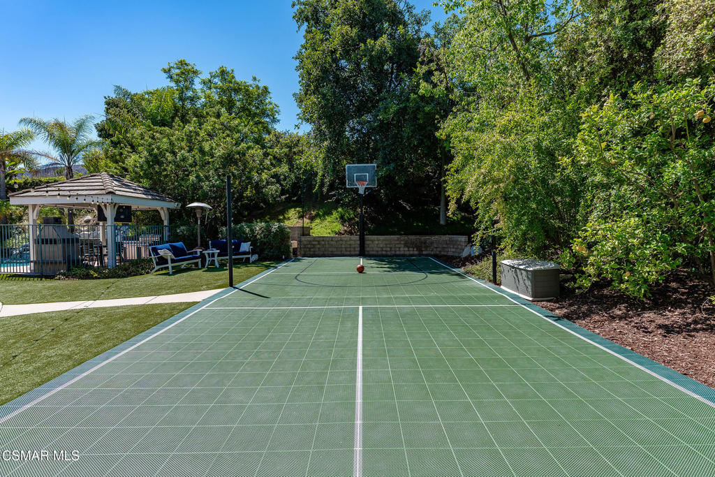 206 Shady Hills Court Simi Valley, CA 93065 - Photo 54 of 84 a view of a tennis ground with large trees
