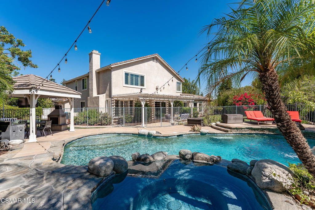 206 Shady Hills Court Simi Valley, CA 93065 - Photo 60 of 84 a view of a house with swimming pool and sitting area