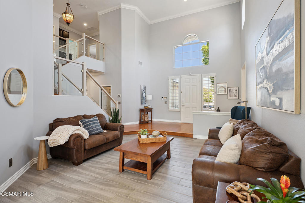 206 Shady Hills Court Simi Valley, CA 93065 - Photo 9 of 84 a living room with furniture and a painting on the wall