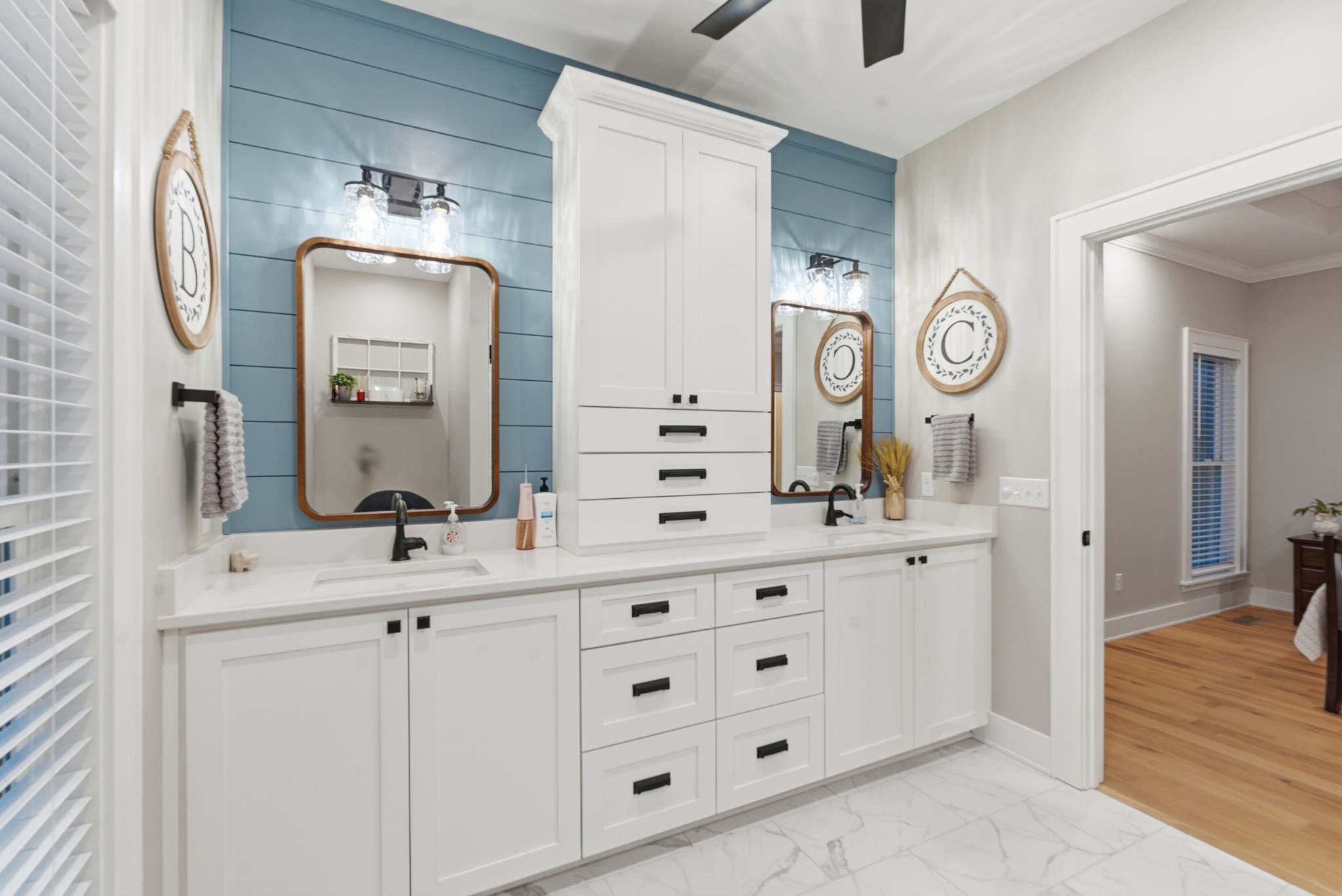 3055 Loren Lane Centerville, TN 37033 - Photo 15 of 40 a bathroom with a double vanity sink and a mirror