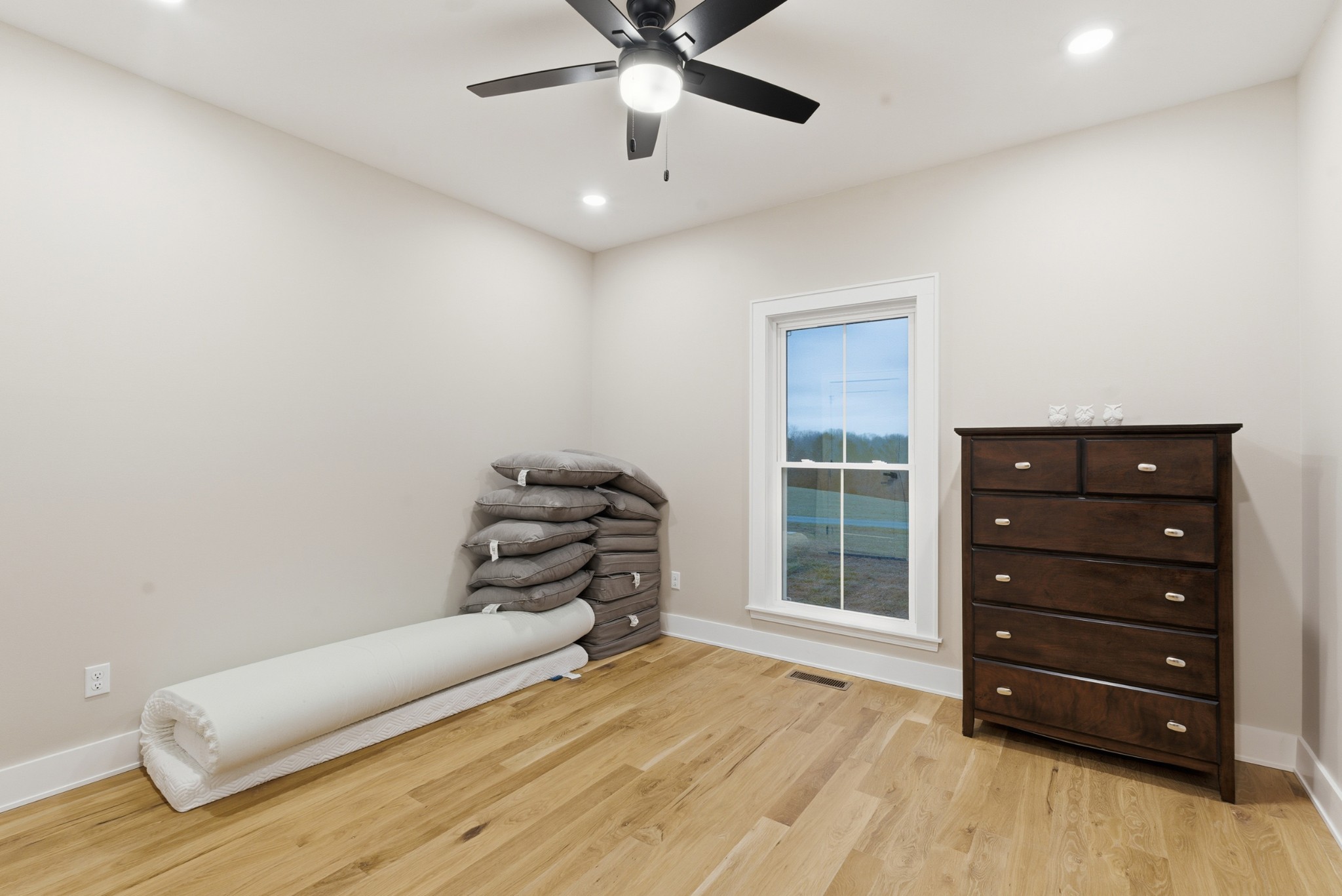 3055 Loren Lane Centerville, TN 37033 - Photo 19 of 40 a bedroom with a bed and a window