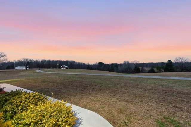 a view of lake with mountain in the background
