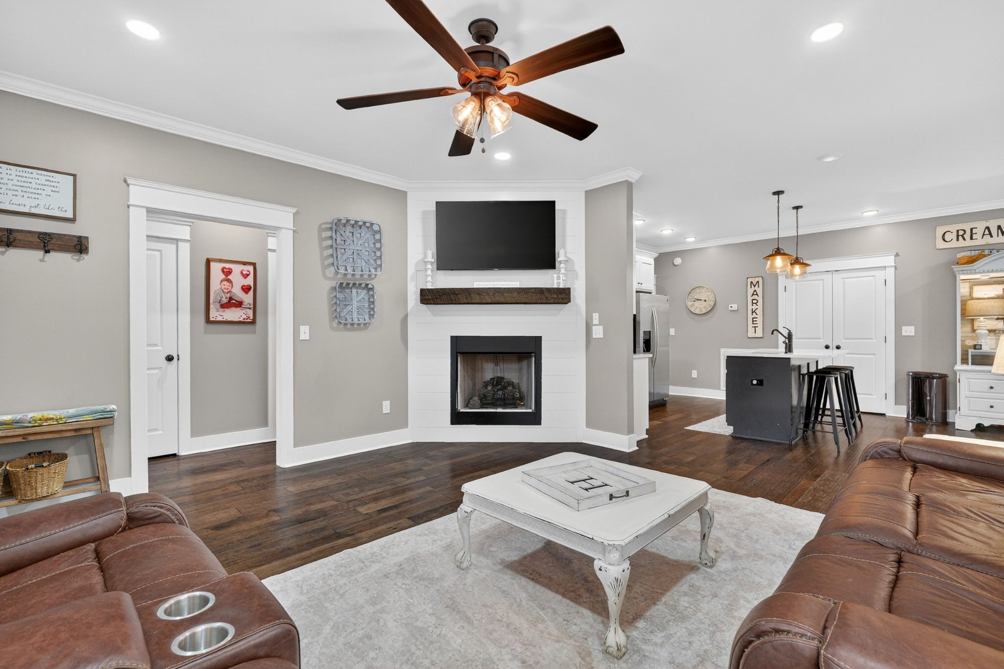 39 Boning Road Fayetteville, TN 37334 - Photo 11 of 43 a living room with furniture a flat screen tv and a fireplace