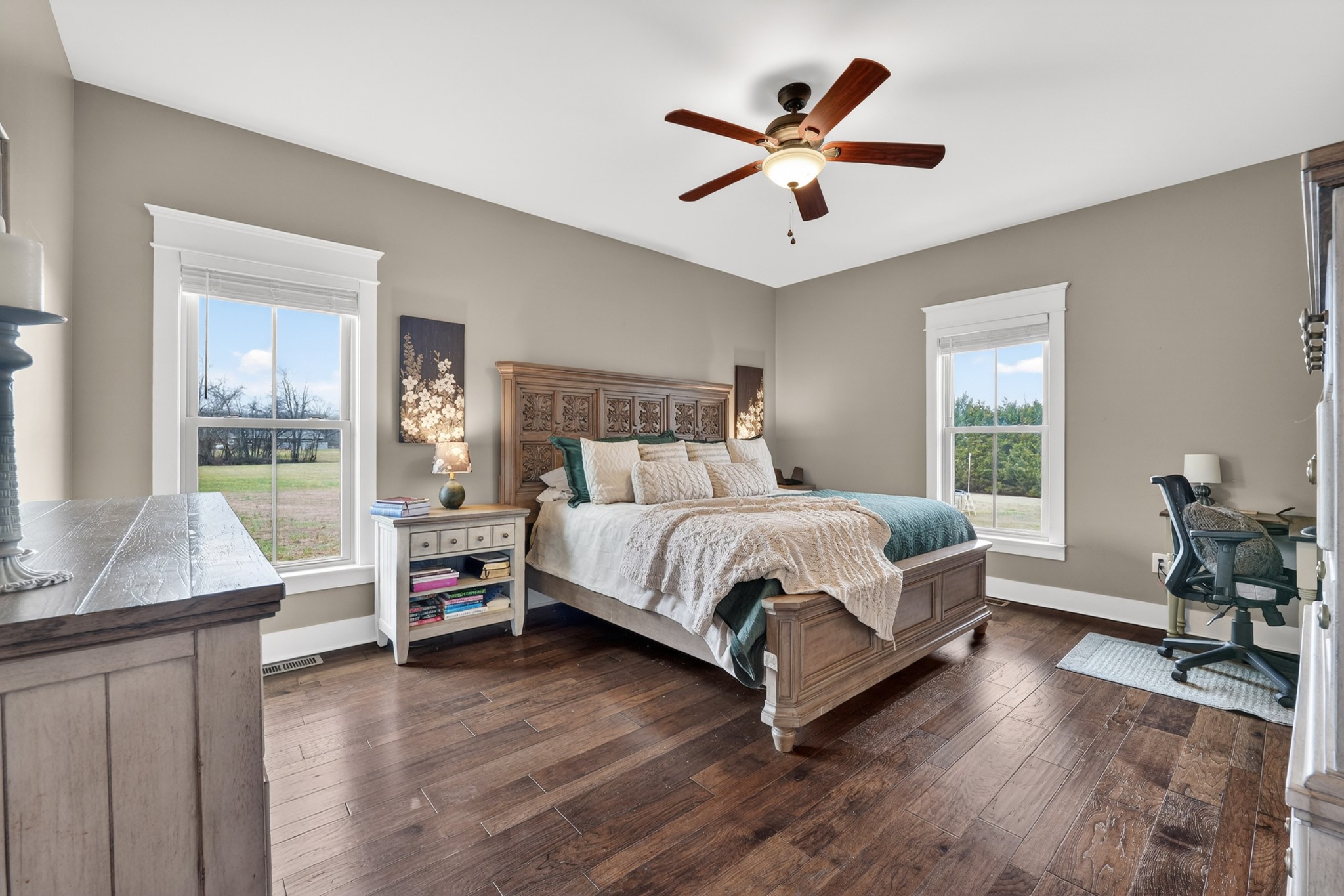 39 Boning Road Fayetteville, TN 37334 - Photo 21 of 43 a bedroom with a bed and wooden floor