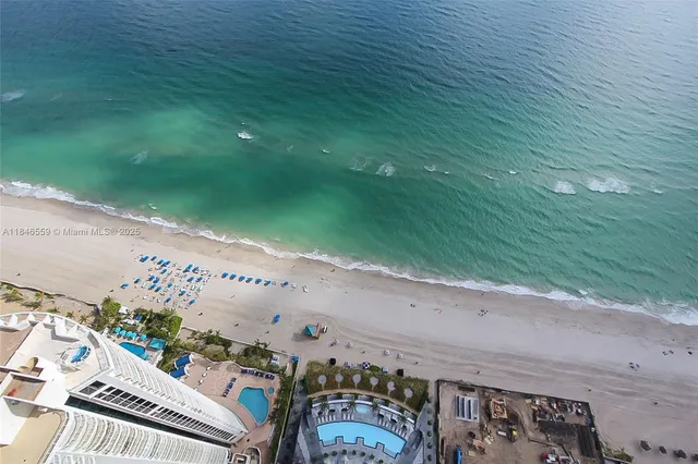 a lobby with furniture and floor