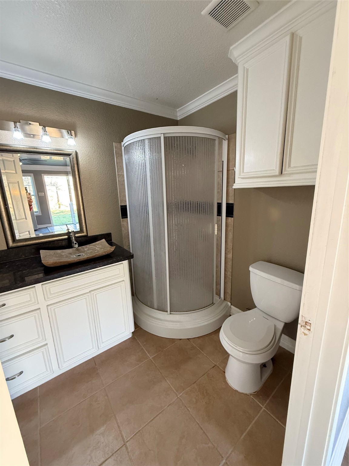 5519 Rio Sabinas Street Rosharon, TX 77583 - Photo 9 of 9 a bathroom with a toilet sink and a mirror