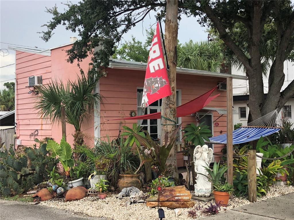 416 Princess Street Clearwater, FL 33755 - Photo 3 of 17 a front view of a house with a tree