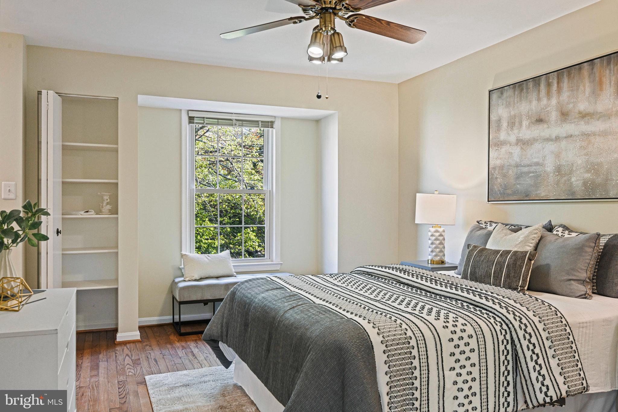 2180 Golf Course Drive Reston, VA 20191 - Photo 19 of 40 a bedroom with a bed and a window