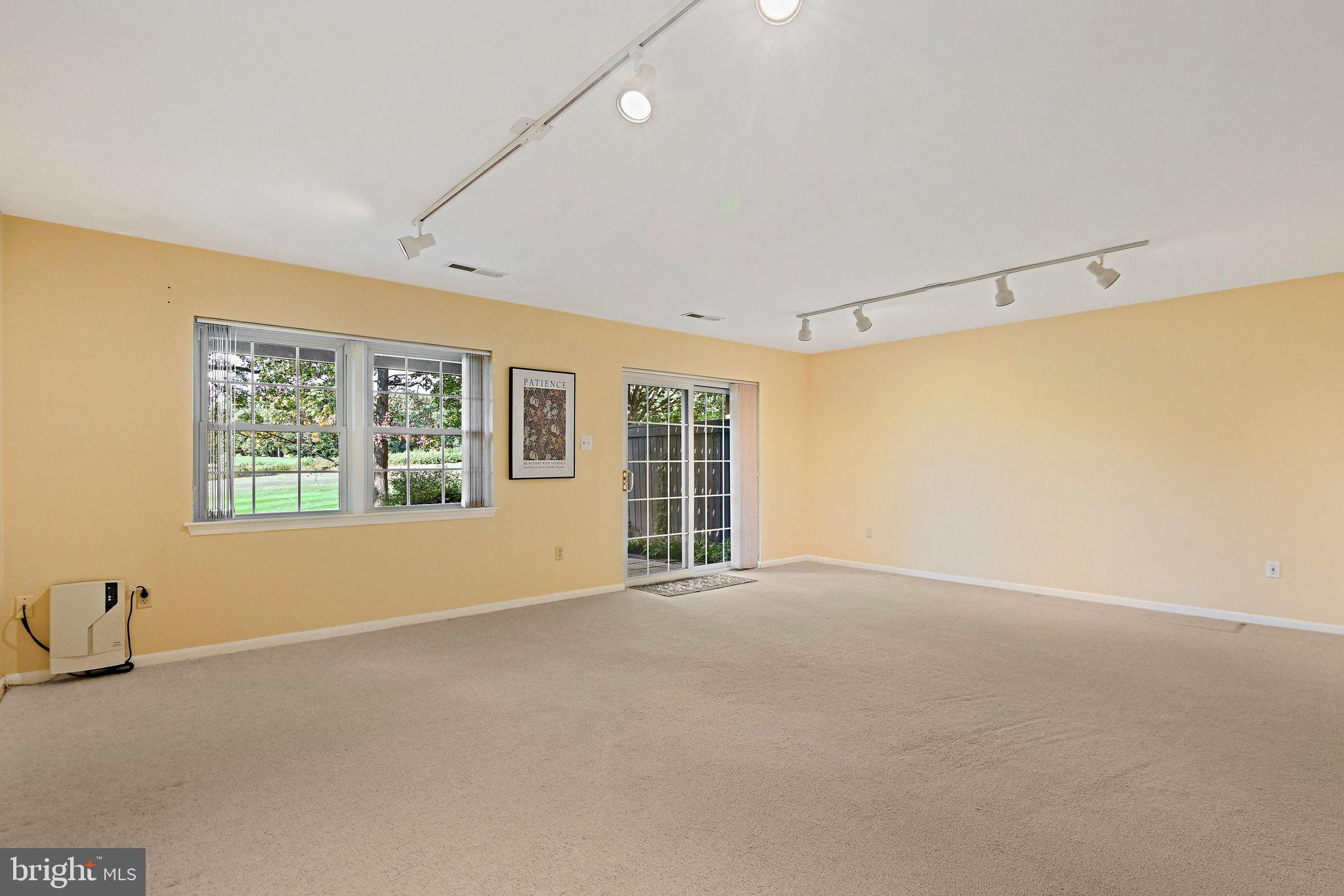 2180 Golf Course Drive Reston, VA 20191 - Photo 31 of 40 a view of an empty room with a window