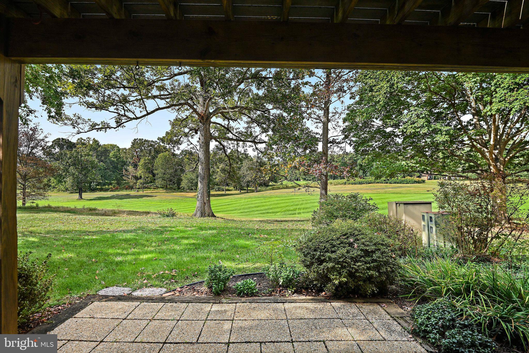 2180 Golf Course Drive Reston, VA 20191 - Photo 33 of 40 a view of a garden with a tree