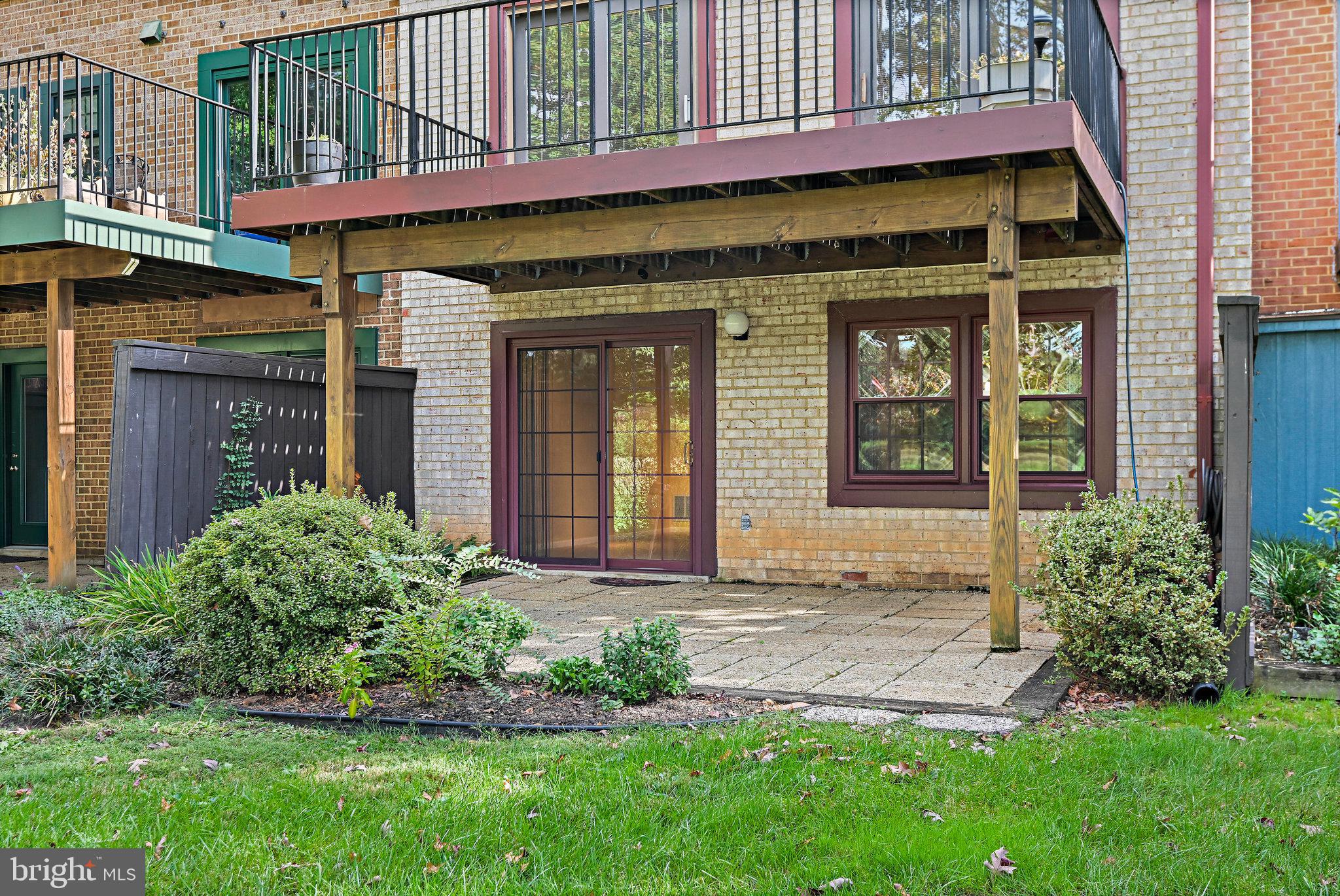 2180 Golf Course Drive Reston, VA 20191 - Photo 34 of 40 a front view of a house with a yard