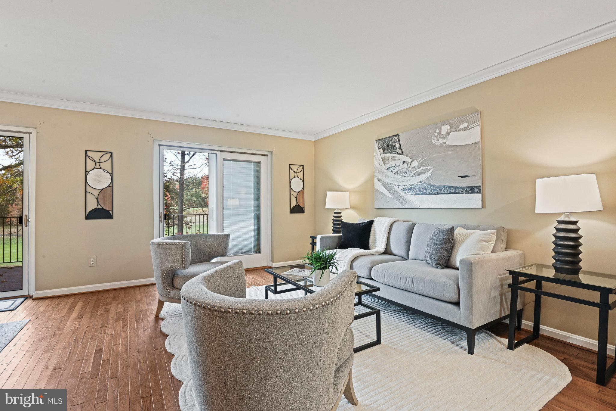 2180 Golf Course Drive Reston, VA 20191 - Photo 10 of 40 a living room with furniture and a window