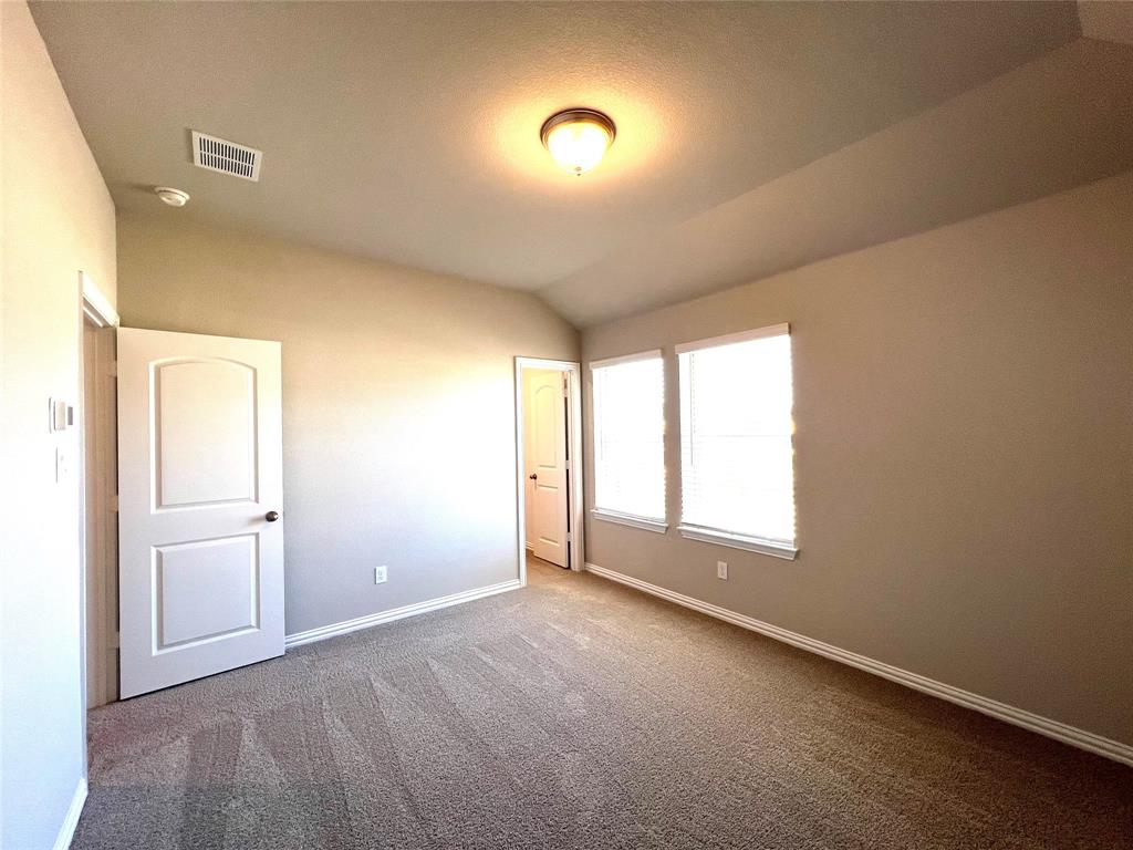 3305 Cross Shr Drive Anna, TX 75409 - Photo 29 of 31 Unfurnished bedroom featuring carpet and lofted ceiling