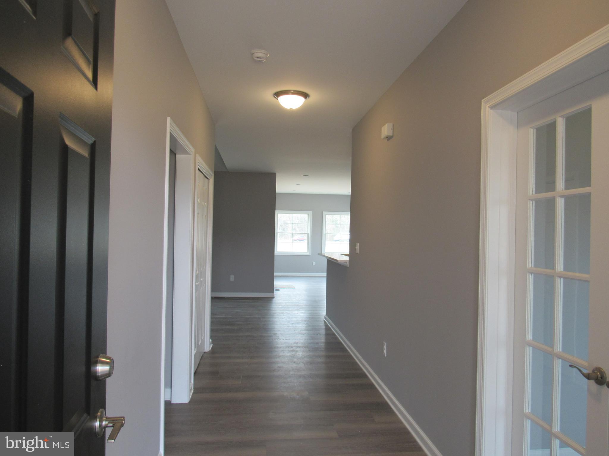 26158 Prettyman Road Georgetown, DE 19947 - Photo 4 of 27 Foyer and Den