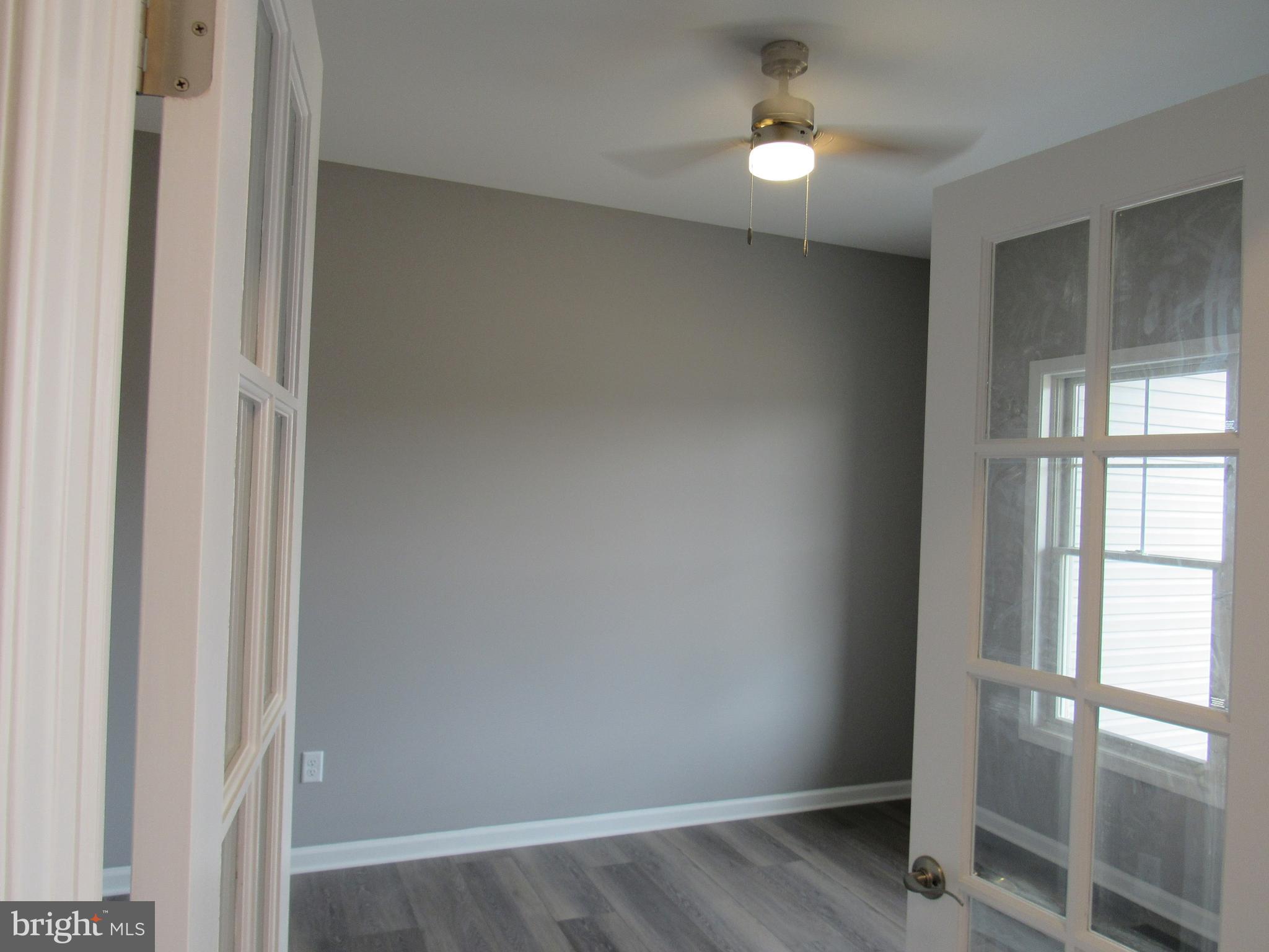 26158 Prettyman Road Georgetown, DE 19947 - Photo 5 of 27 Den with french doors