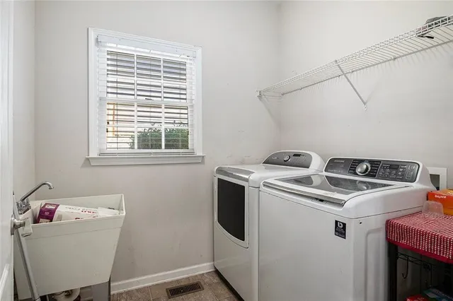 a view of hallway with wooden floor