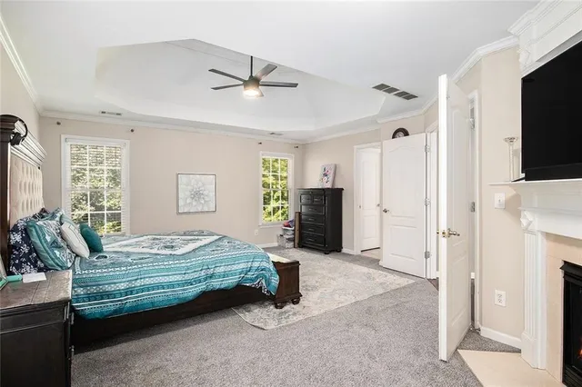 a spacious bathroom with a double vanity sink and a mirror