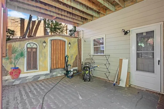 a view of a house with a yard and plants