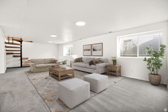 4155 Johnson Road Nibley, UT 84321 - Photo 33 of 71 Virtually staged. Spacious living area featuring light gray carpet, multiple windows, a spiral staircase with wood treads, recessed lighting, and white walls