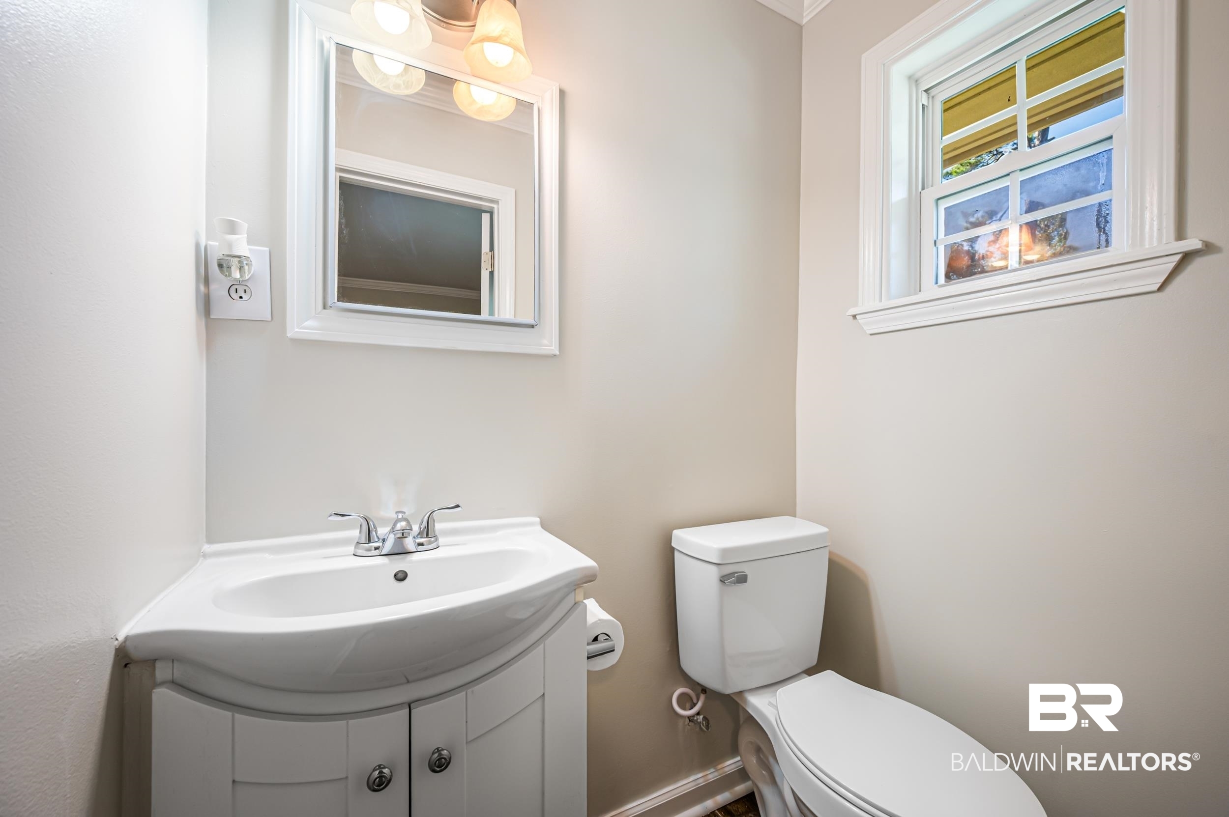 1605 Collier Avenue Bay Minette, AL 36507 - Photo 27 of 36 Bathroom featuring vanity and ornamental molding