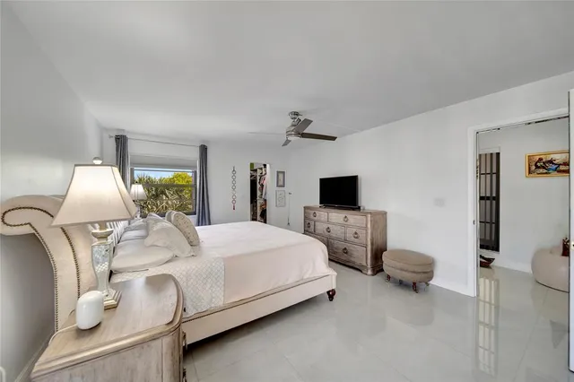 a living room with furniture pool table and a table
