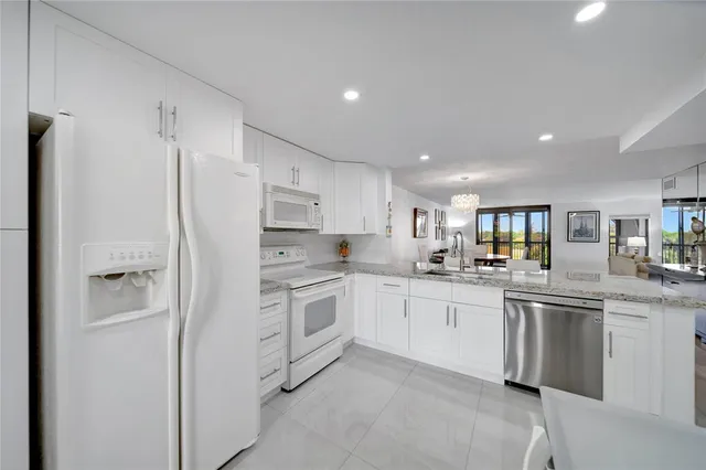 a view of a hallway with wooden shelves
