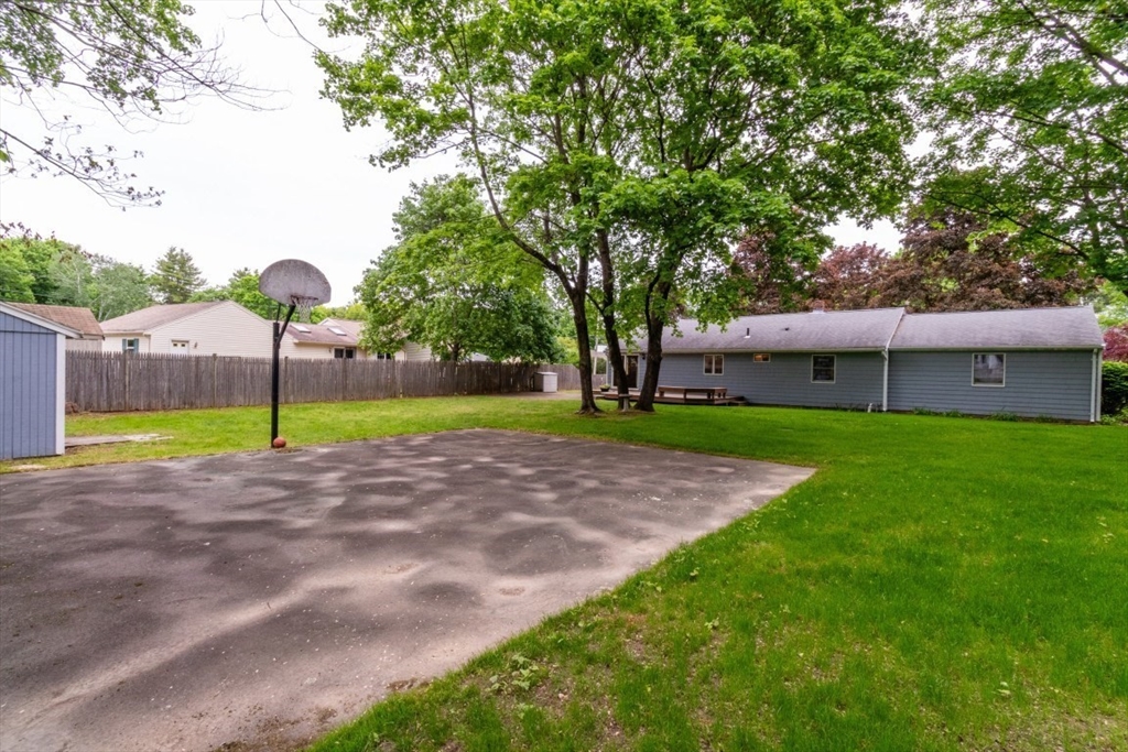 118 Bruce Road Walpole, MA 02081 - Photo 23 of 30 a view of a house with a big yard and large tree