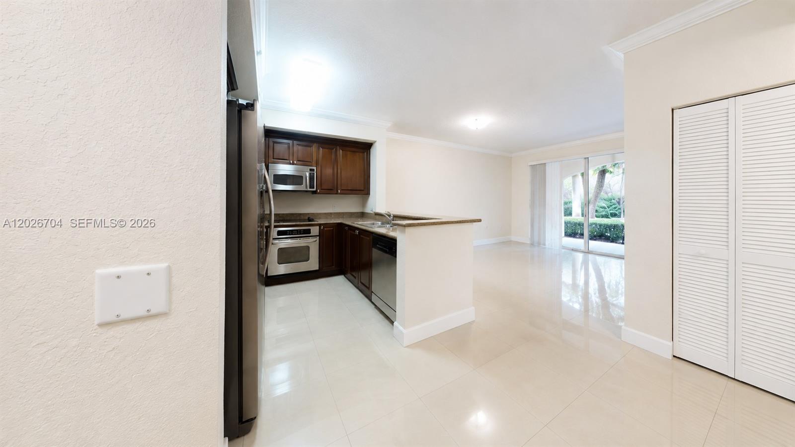 4106 Renaissance Way, Unit 106 Boynton Beach, FL 33426 - Photo 1 of 14 a view of a kitchen with a sink